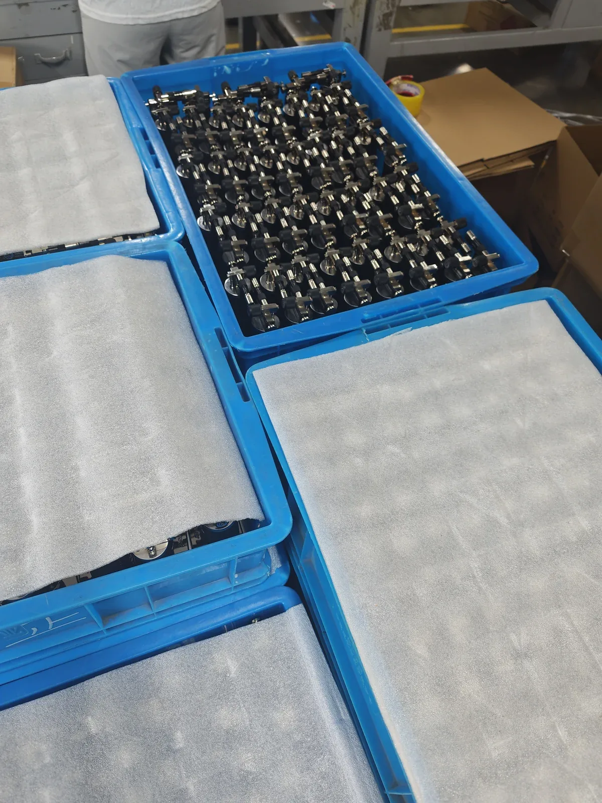 Completed flame-tool units organized in production trays